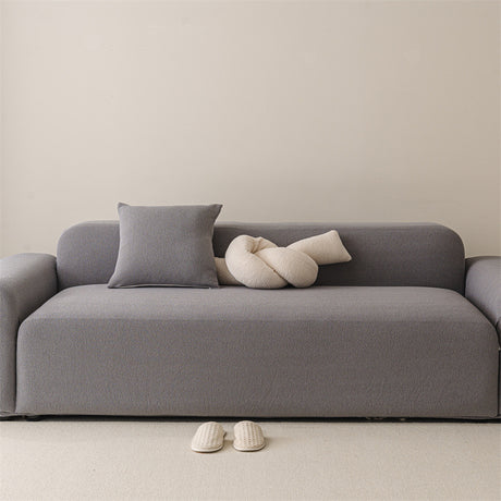 Housse de canapé extensible haut de gamme déperlante texture teddy gris 