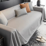 Jeté de canapé XXL simili cuir imperméable et hydrofuge gris clair